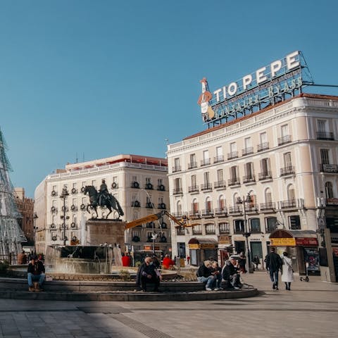 Explore Puerta del Sol, a twenty-minute ride away