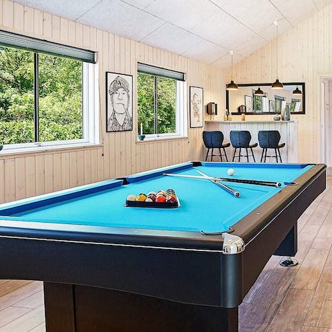 Gather in the games room for a friendly round of billiards