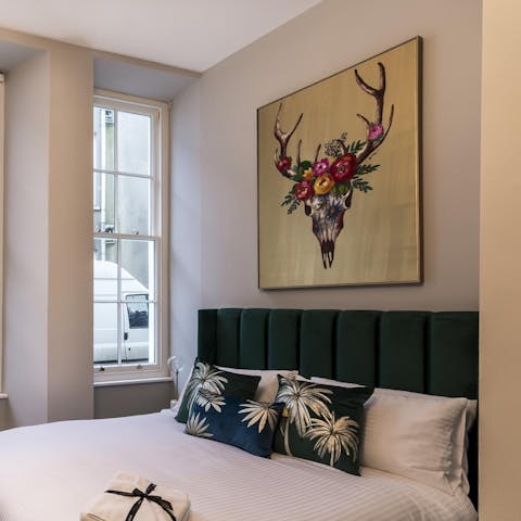 Admire the bold, modern art of the bedrooms