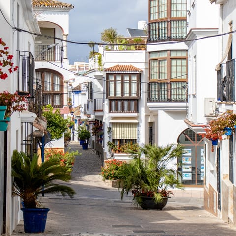 Drive into Estepona and dine in a traditional restaurant