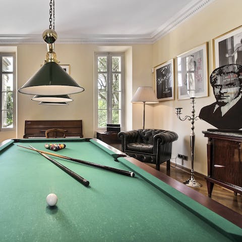 Play a round of snooker in the games room