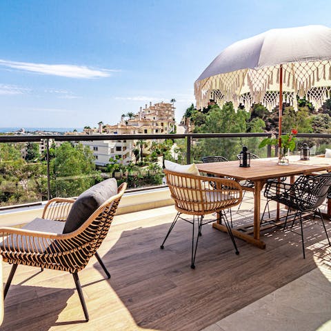 Admire the views on the sun-trap terrace, a glass of sangria in hand 