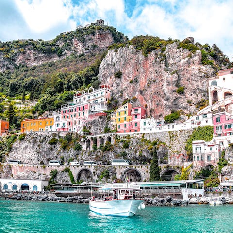 Embark on a scenic Amalfi Coast boat trip from nearby Marina Lobra
