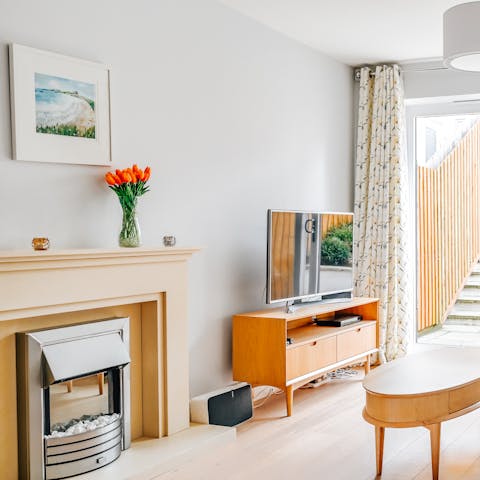 Curl up in the bright and cosy living room after a day discovering Newquay
