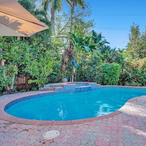 Cool off with a dip in your sun-dappled pool
