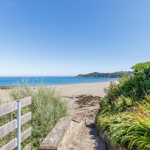 Stroll past the hydrangeas to the bottom of your garden to embrace private access to the beach