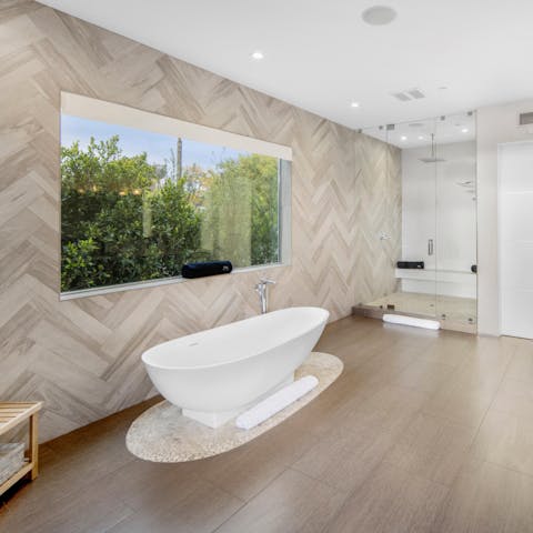 Luxuriate in the freestanding tub and gaze out of the large picture window