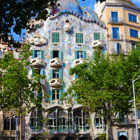 Admire Gaudí's Casa Batlló, a mere 130 metres from your building