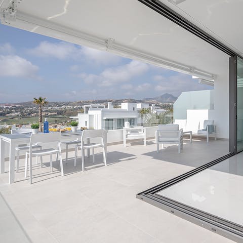 Step out of the living area and onto the large private terrace