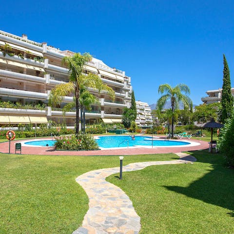 Jump into the communal pool after a road trip on the Costa del Sol