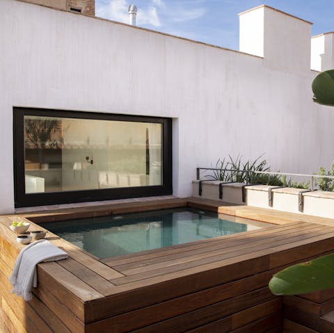 Gaze out at the glistening Mediterranean from your rooftop Jacuzzi