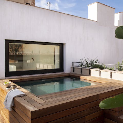 Gaze out at the glistening Mediterranean from your rooftop Jacuzzi