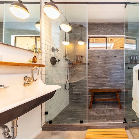 Take blissful showers in the sleek bathroom