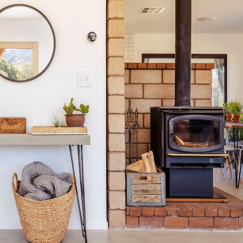 Cosy up by the wood-burning stove