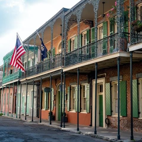 Explore the vibrant French Quarter, a fifteen-minute drive from your home