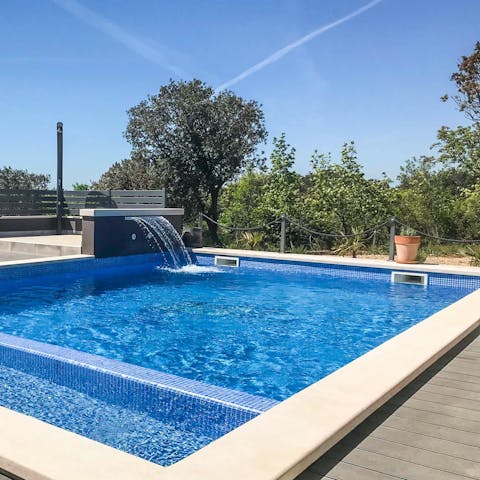 Enjoy a refreshing dip in the private pool as the sun warms your skin