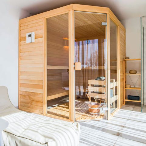 Relax in the private sauna, part of the villa's wellness room