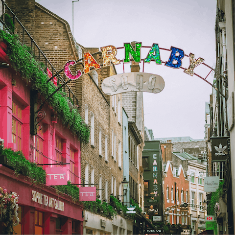 Indulge in some retail therapy along Carnaby Street, a ten-minute walk away