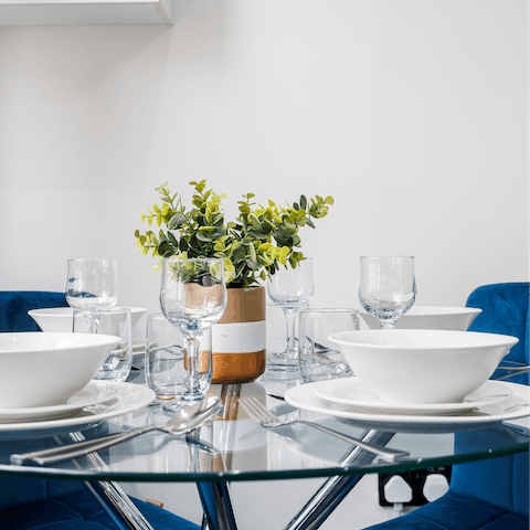 Sit down for a home-cooked meal around the stylish dining table