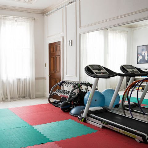 Squeeze in an early morning workout in the home's gym