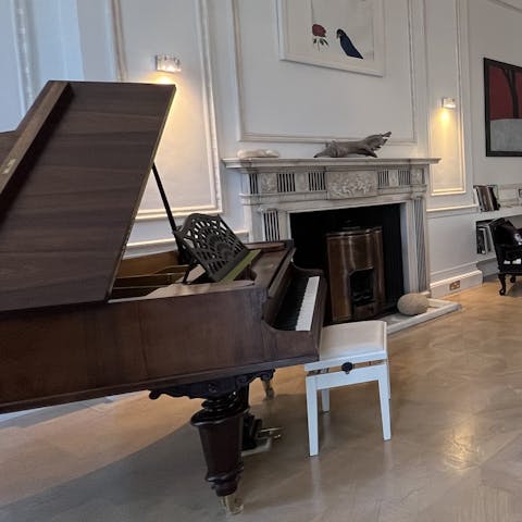 Serenade guests with a tune on the grand piano