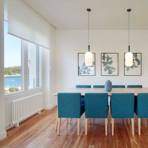 Dine with picturesque bay views at the large dining table
