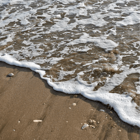 Splash in the shallows of Plage de la Grève Blanche – it's a one-minute walk away