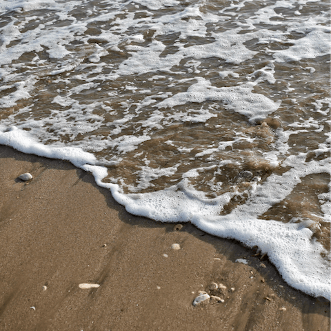 Splash in the shallows of Plage de la Grève Blanche – it's a one-minute walk away