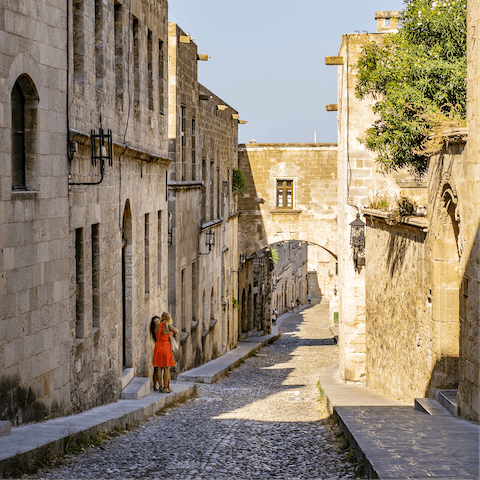Explore historic Old Town Rhodes, about ten minutes by car