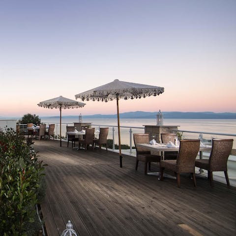 Dine on creative cuisine overlooking Toroneos Bay