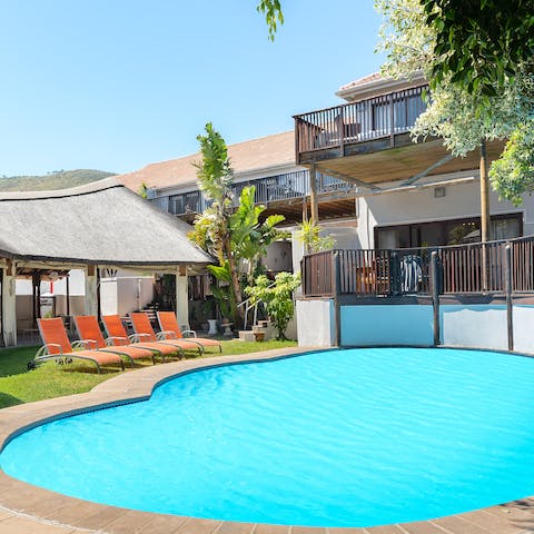 While away sunny afternoons tanning by the shared pool and taking dips in its cool waters