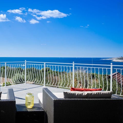 Gaze out at the beautiful coastal panorama from the terraces