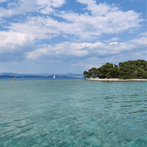Splash about in the azure Adriatic Sea that sits all of 300 metres from the home