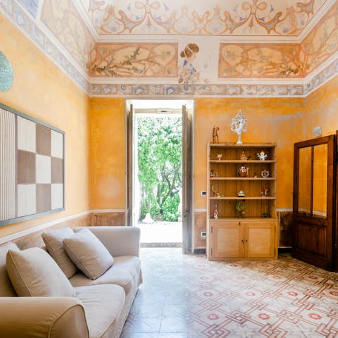Admire the old-world Italian frescoed ceilings and tiled floors inside