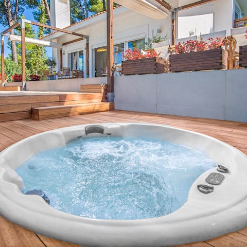 Watch your worries fade away in the hot tub