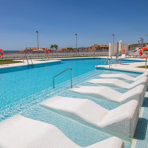 Soak up the sun from the cooling waters of the shared pool