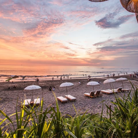 Take a leisurely stroll to the surf-friendly beaches of Canggu