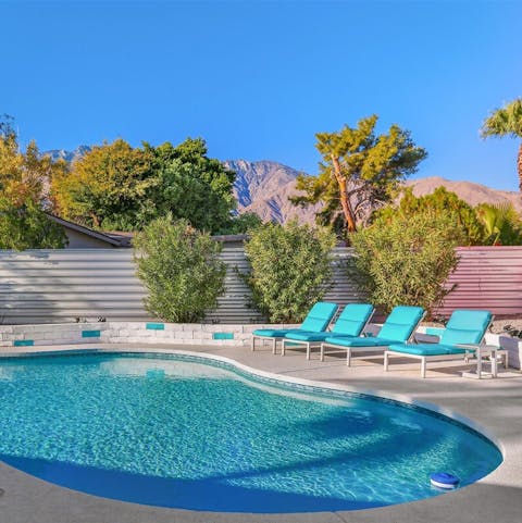 Relax poolside with glorious mountain views