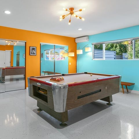 Shoot some pool on the vintage table in the games room