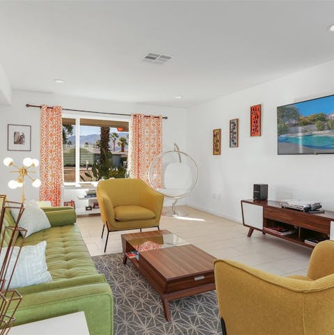 Appreciate the sleek mid-century interiors