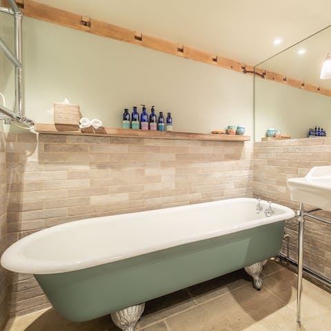 Treat yourself to a long soak in the freestanding tub after a day spent in the great outdoors