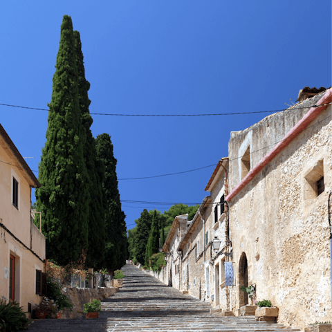 Wander about the cobbled streets and stone architecture of surrounding Pollença