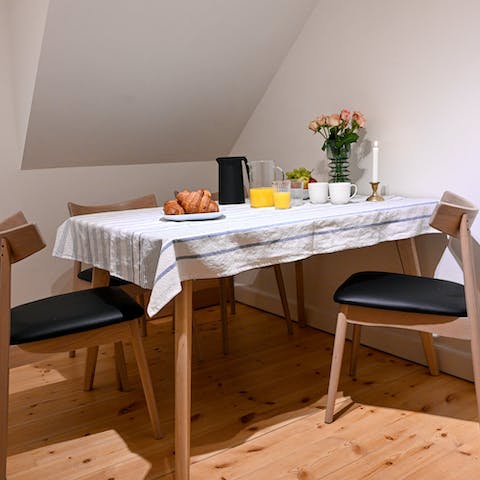 Sit down for breakfast at the dining table before setting off