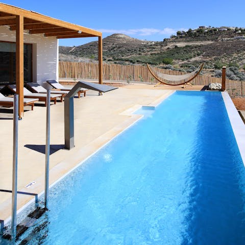 Kick back in your private heated swimming pool