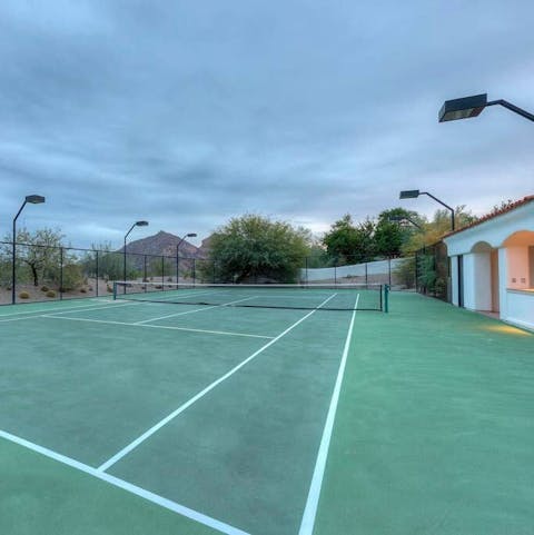 Practice your backhand on your private tennis court 