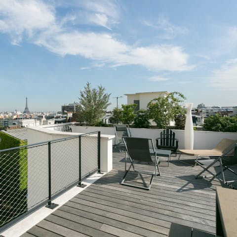 Hang out on the roof terrace with a view of the Eiffel Tower