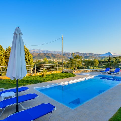 Jump into the swimming pool and admire the views of Cretan countryside