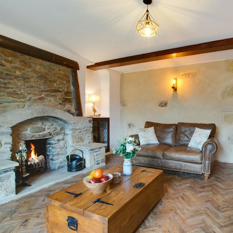 Put your feet up in front of a real fireplace in this traditionally cosy living room