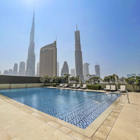 Spend relaxing days lounging by the pool with a clear view of the towering Burj Khalifa