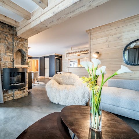 Curl up by the fireplace for a cosy evening after a day on the slopes